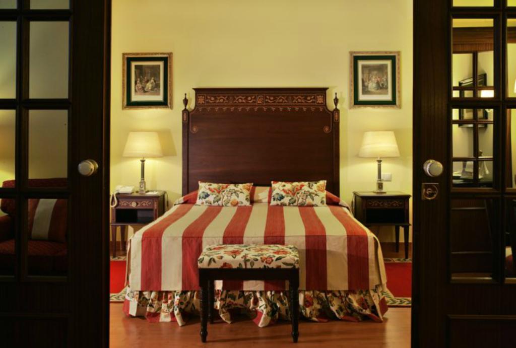 Hotel Avenida Palace Lisboa Δωμάτιο φωτογραφία A bedroom at the hotel